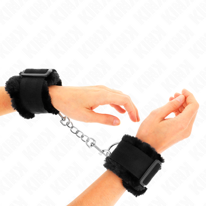 Manette e restrizioni Poggipolsi foderati in pelliccia neri regolabili 17-31 cm x 7 cm di Kink